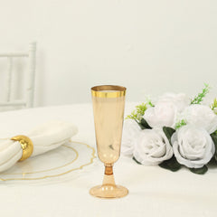 12-Pack Plastic Champagne Flutes Transparent Amber Gold with Gold Rim - Stylish Disposable Cocktail Glasses for Parties 5oz 6"