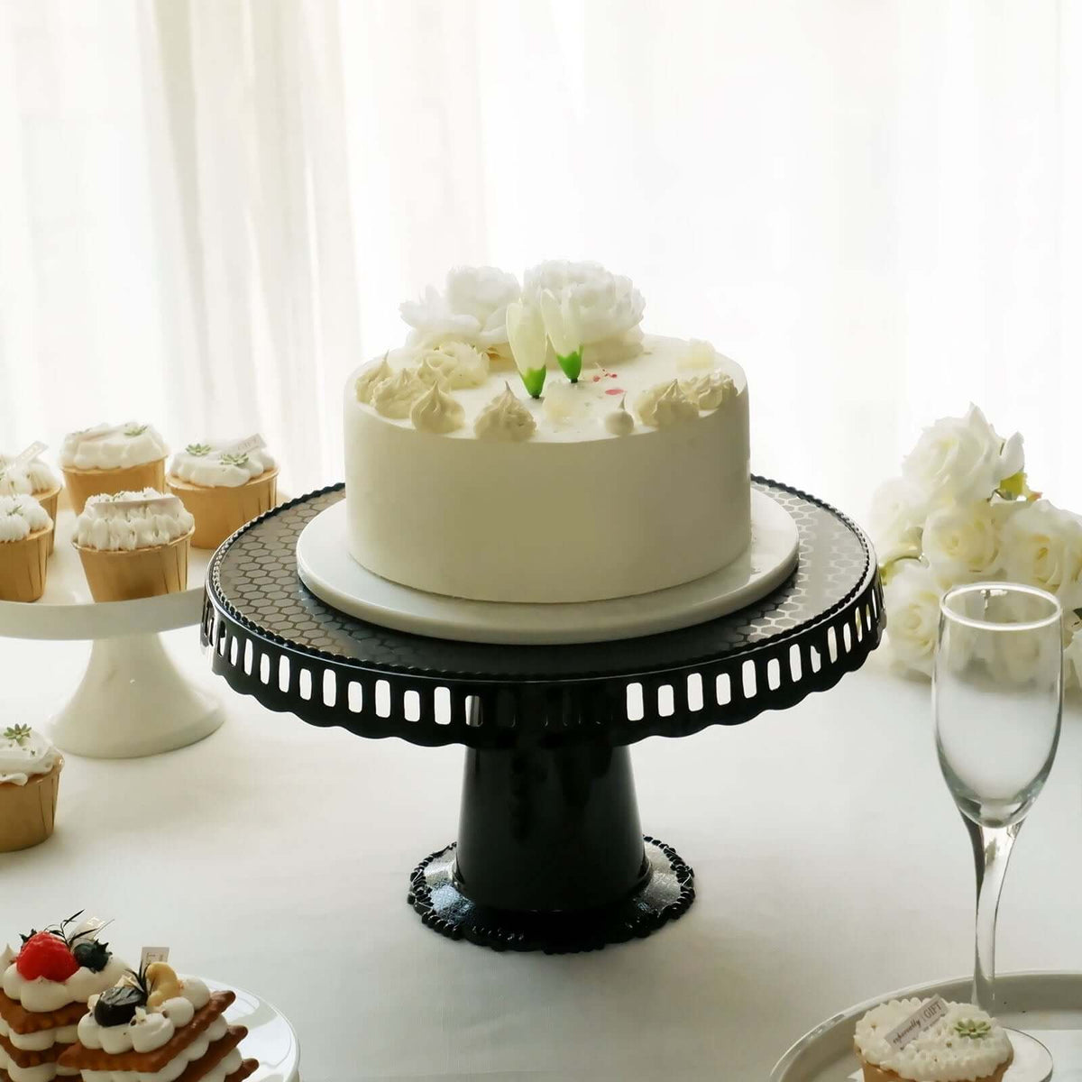 4-Pack Plastic Round Pedestal Cake Stands Black - Reusable Cupcake Pastry Display Risers with Hollow Ribbon Trim Edges for Stylish Dessert Presentation 13"