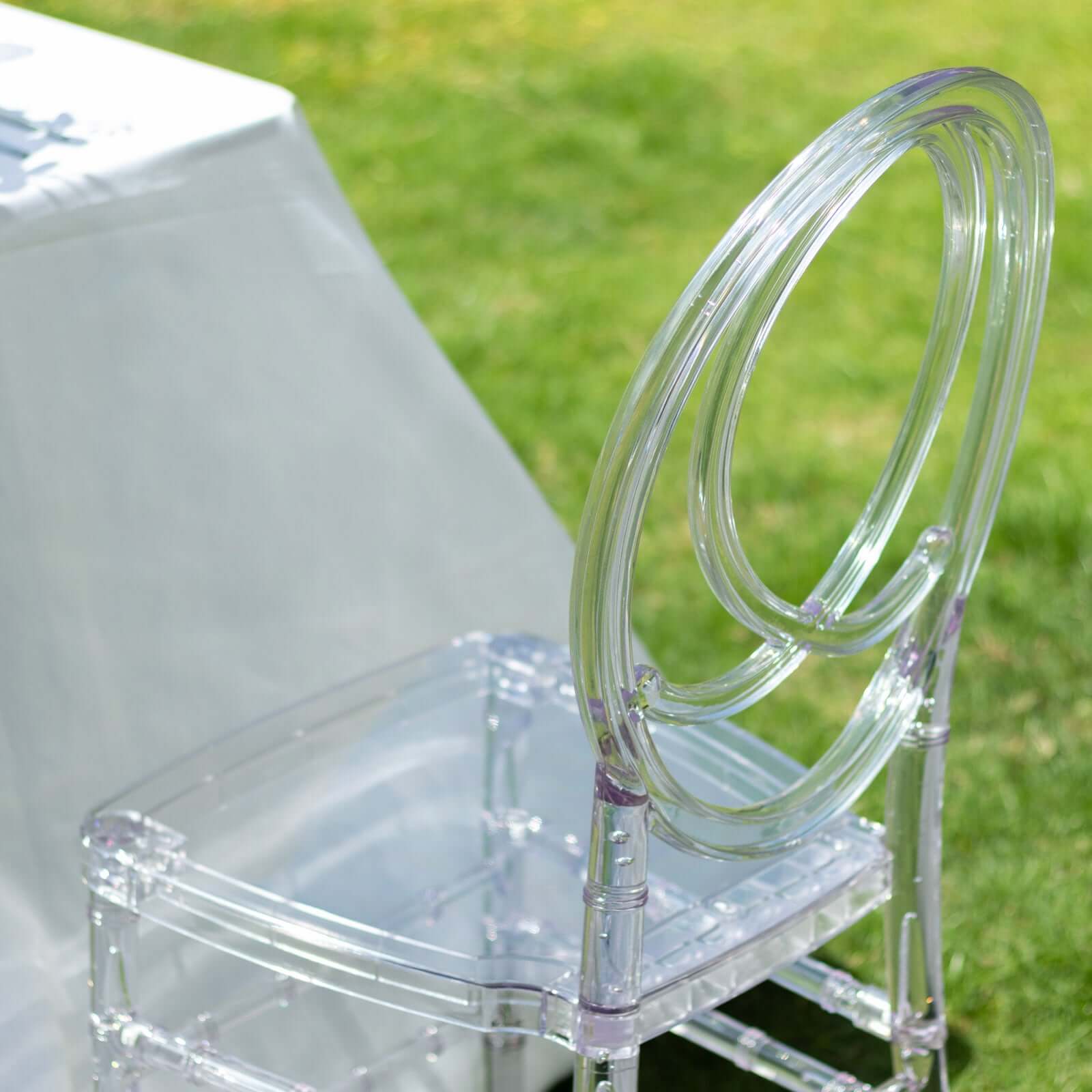 Acrylic Stackable Ghost Chair in Phoenix Chiavari style Transparent Resin with Oval Back Clear - Sleek Armless Design for Weddings & Gatherings