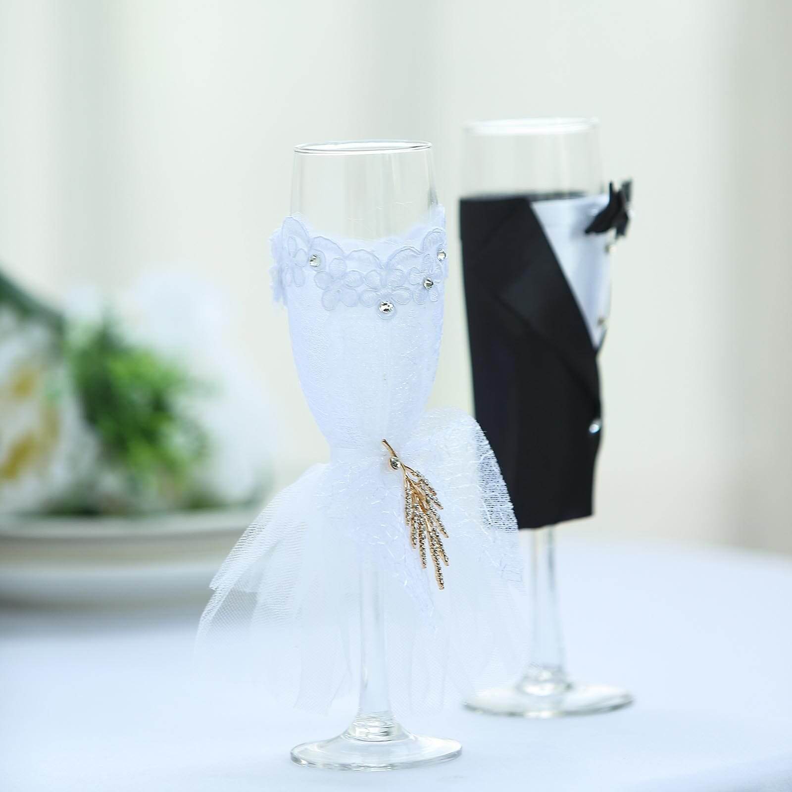 Set of 2 Clear Champagne Flutes with Black Bride and Groom Koozies - Wedding Toast Glasses 9"