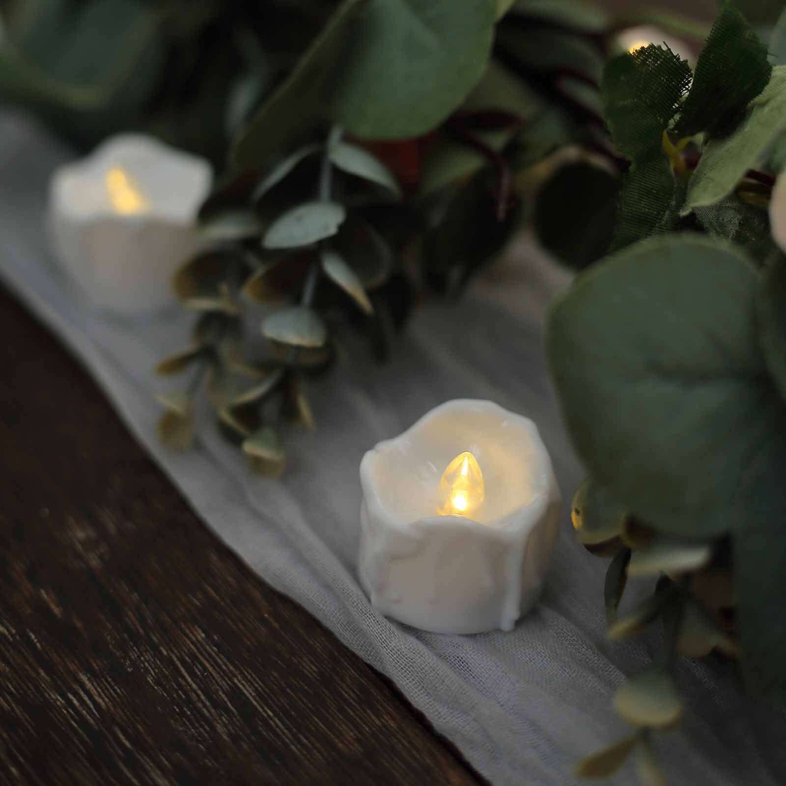 12-Pack LED Flameless Luminaria Lighting Warm White - Battery Operated Tealight Candles with Realistic Wax Design 1.5"