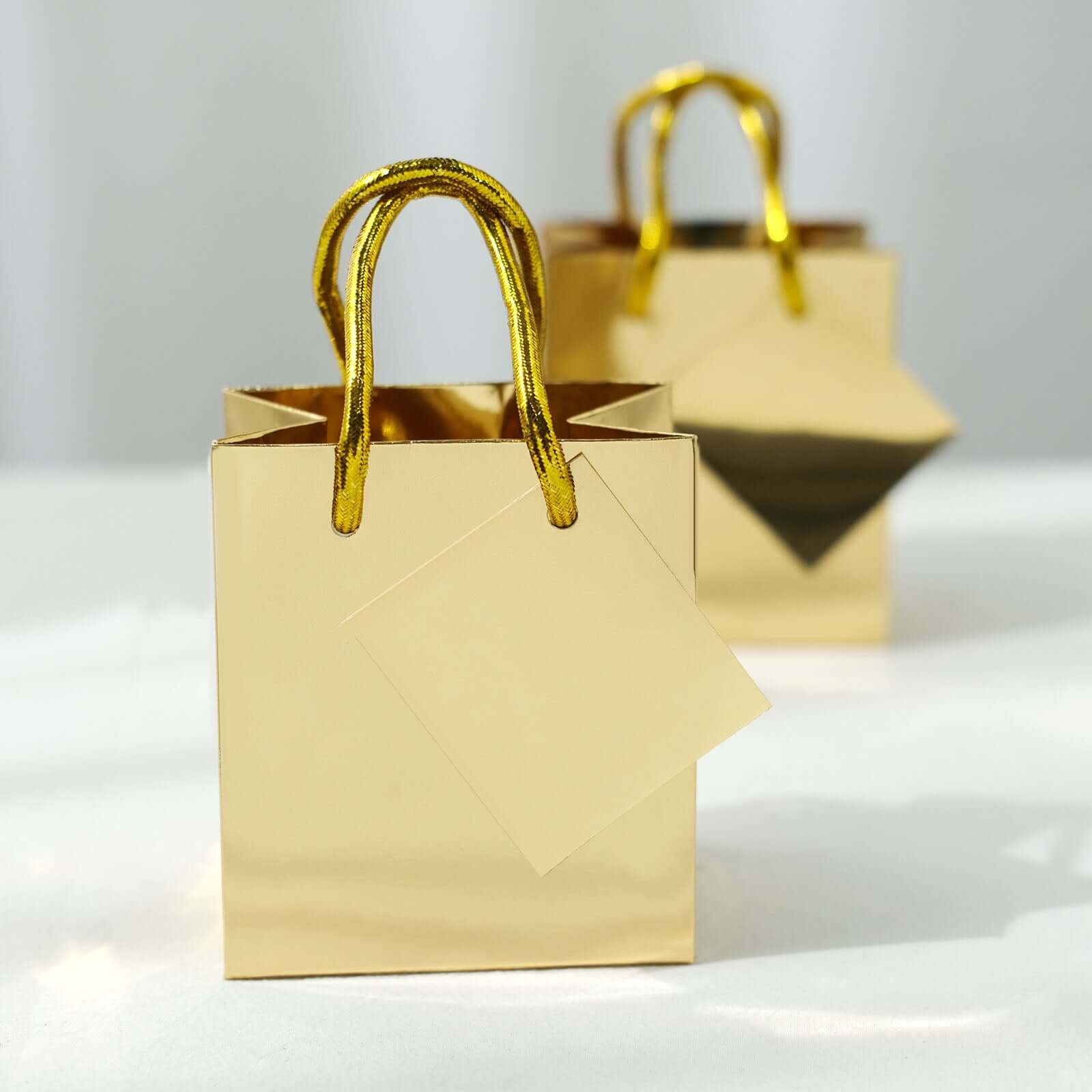 12 Pack 5" Shiny Metallic Gold Foil Paper Party Favor Bags With Handles, Small Gift Wrap Goodie Bags