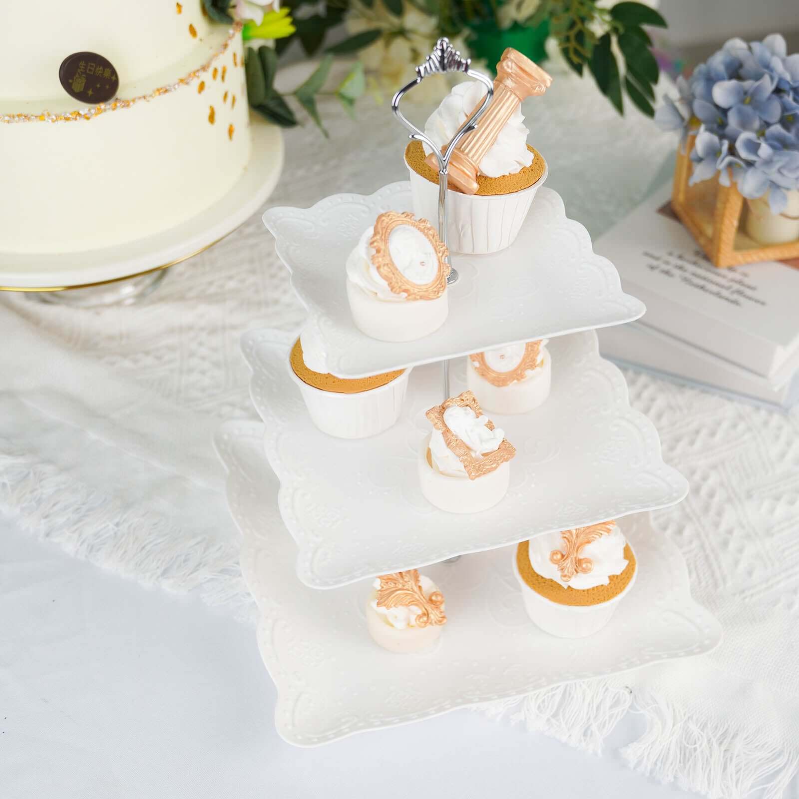 3-Tier Plastic Square Cupcake Stand Tower White - Charming Easy to Assemble Dessert Display Serving Tray Platter with Floral Embossed Scalloped Rim & Silver Handle for Tea Parties Weddings & Special Occasions 13"