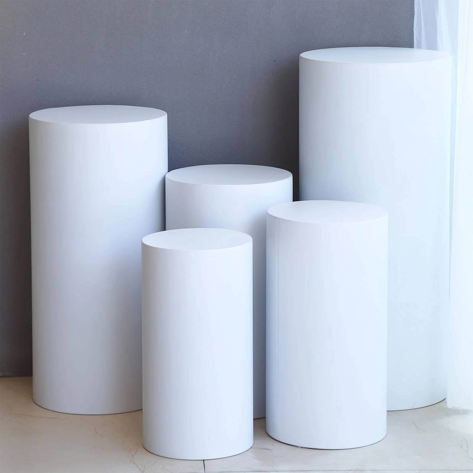 Set of 5 White Metal Cylinder Pillar Prop Stands For Wedding Aisle, Round Plinth Pedestal Display Boxes - 20", 22", 24", 30", 34"