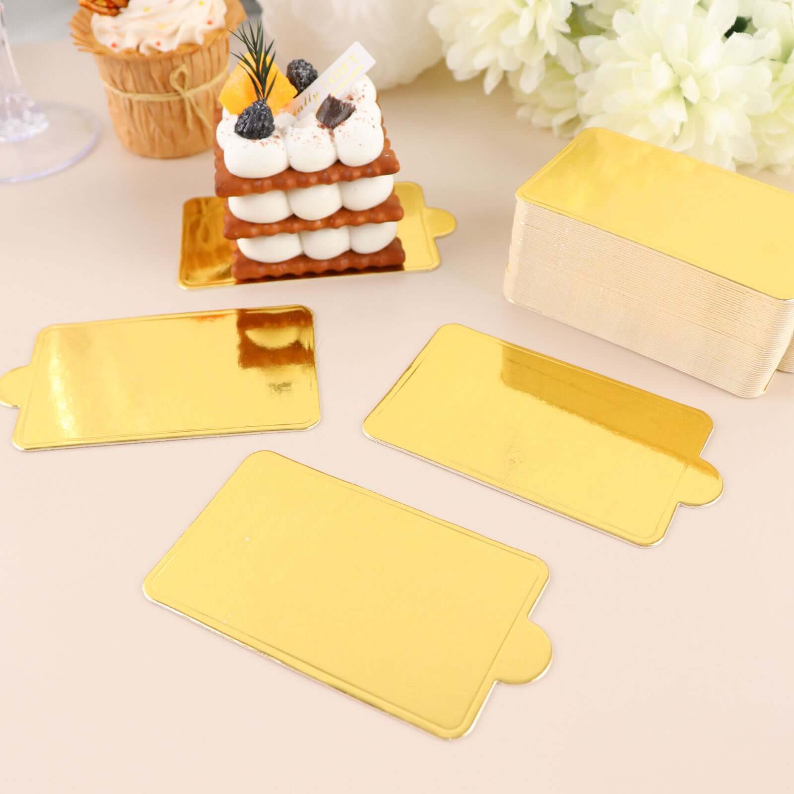 50-Pack Rectangle Cake Boards in Gold Cardboard - Grease Proof Mini Paper Trays for Pastries Cupcakes & Dessert Slices 2.4"x4"