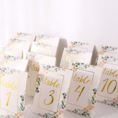 25-Pack Paper Wedding Table Numbers 1-25 White Peony Flower Design - Free Standing Double Sided Table Signs with Glam Gold Foil Numbers 7"