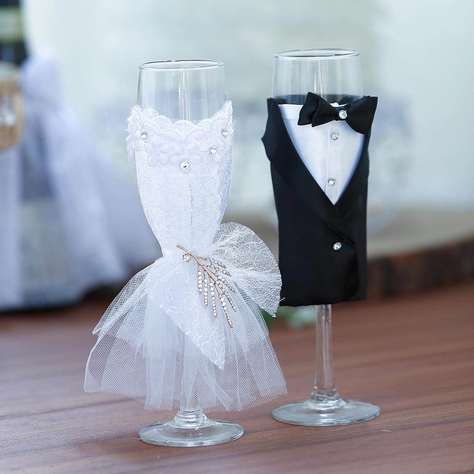 Set of 2 Clear Champagne Flutes with Black Bride and Groom Koozies - Wedding Toast Glasses 9"