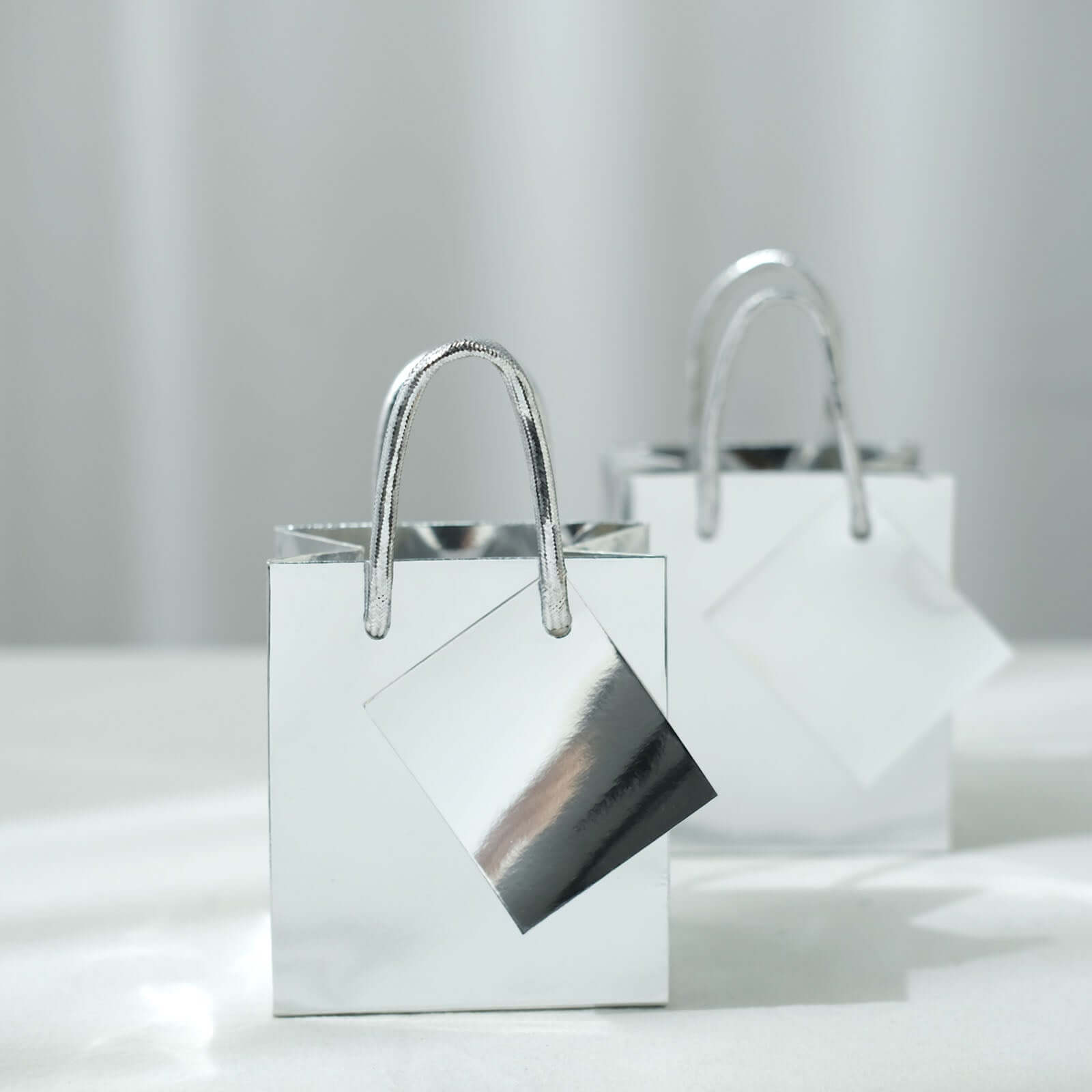 12 Pack 5" Shiny Metallic Silver Foil Paper Party Favor Bags With Handles, Small Gift Wrap Goodie Bags
