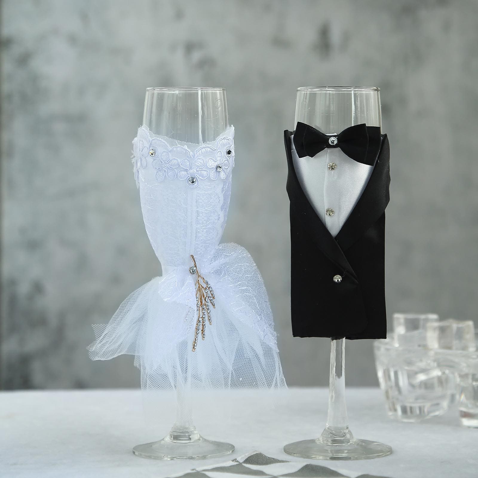 Set of 2 Clear Champagne Flutes with Black Bride and Groom Koozies - Wedding Toast Glasses 9"