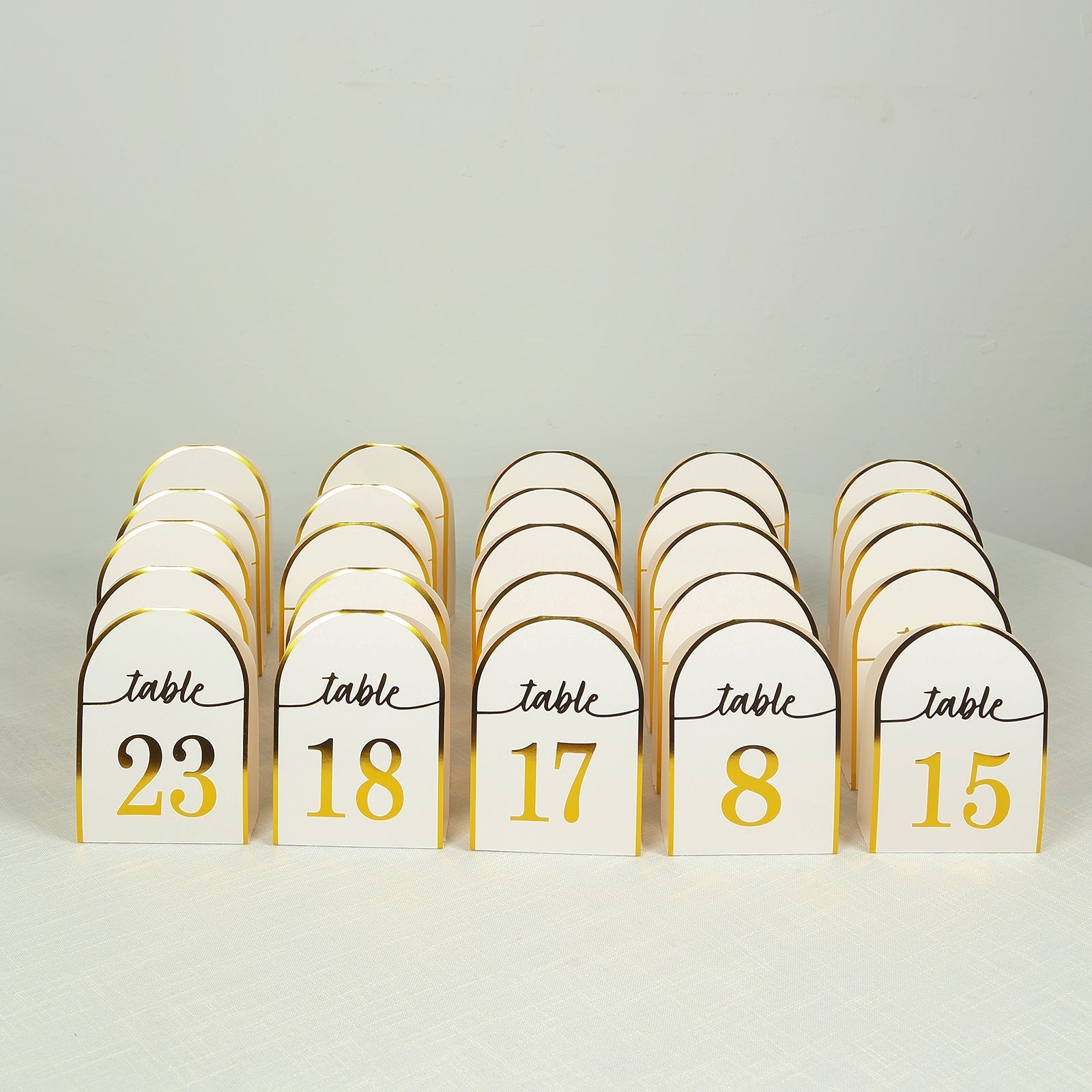 25-Pack Paper Wedding Table Numbers 1-25 White Arch Cutout Design - Sleek & Modern Free Standing Double Sided Table Tent Cards with Metallic Gold Foil Numbers 7"