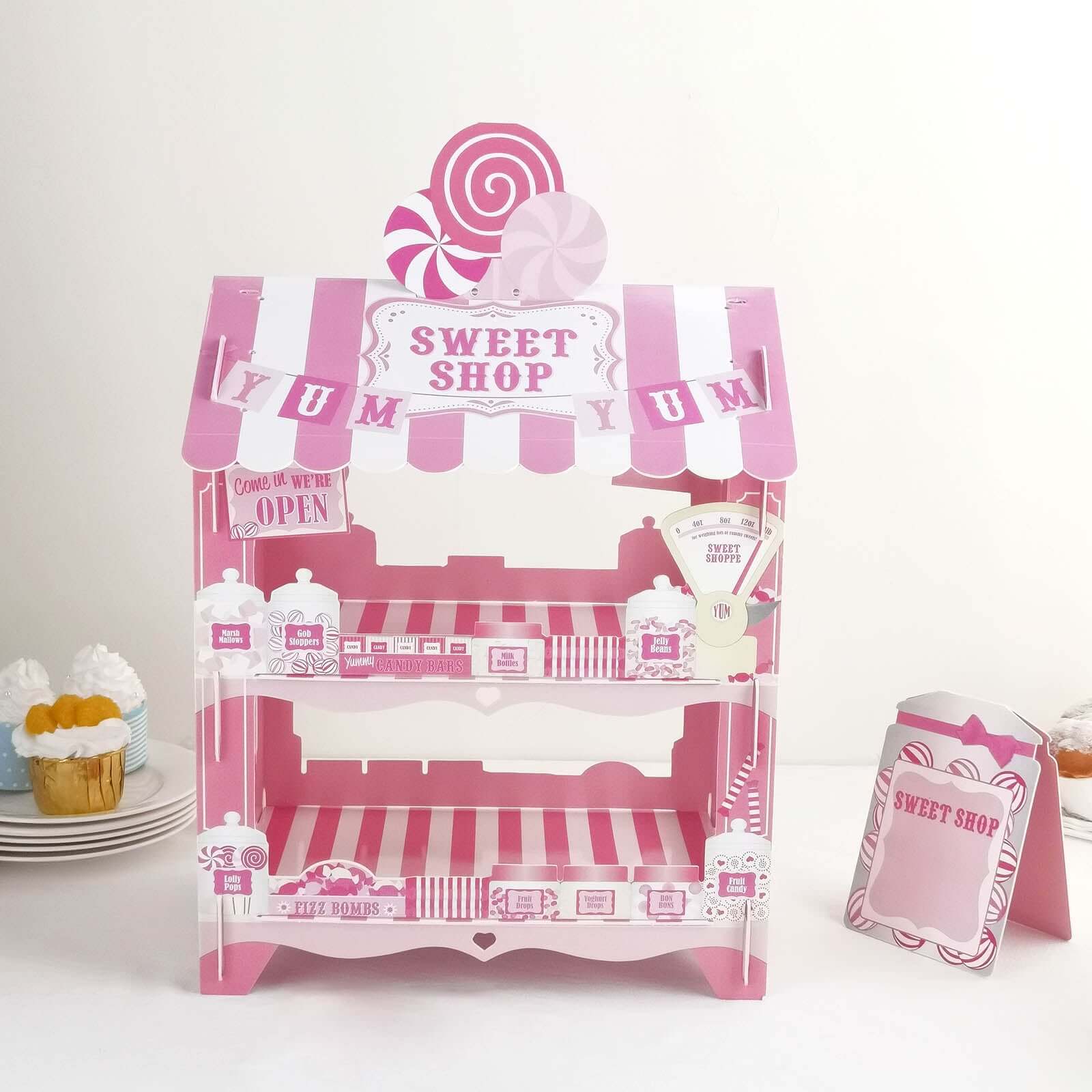 2-Tier Cardboard Cupcake Stand with White/Pink Sweet Shop Design - Colorful Candy Themed Dessert Cart Display for Pastries & Treats 18"