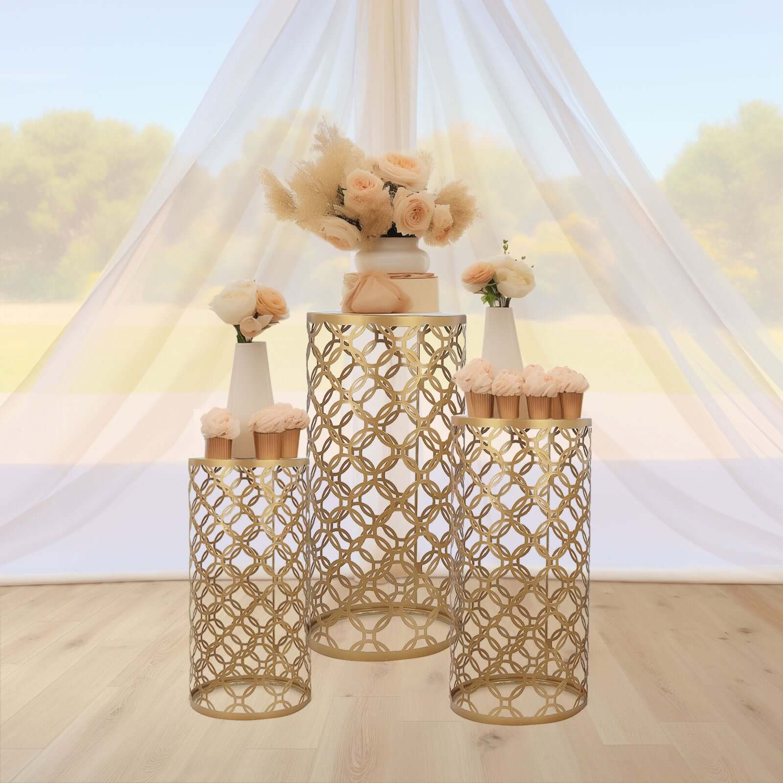 Set of 3 Gold Metal Cylinder Pillar Cake Display Stands, Round Mesh Plinth Pedestal Stand in Hollow Overlapping Circles Pattern - 22",24",30"